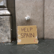 Image for article titled Street art imitates life in Barcelona: Beg, scavenge or die